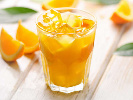 Glass of fresh Orange juice  with ice . Selective focusの写真素材