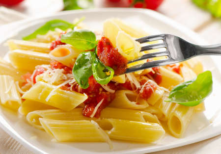 Italian Pasta penne with bolognese sauce .  Mediterranean cuisine. Selective focusの写真素材