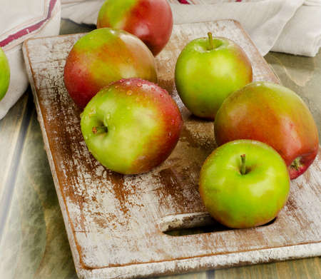 Apples on the wooden table. Selective focusの写真素材