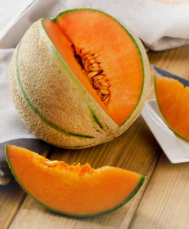 Melon  on a  wooden background. Selective focusの写真素材