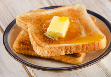 Toast bread on a wooden background. Selective focusの写真素材