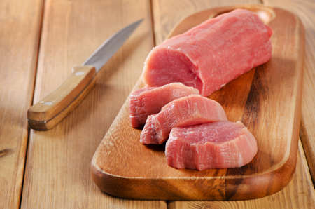 Raw beef  on  cutting board. Selective focusの写真素材
