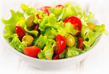 Fresh  vegetables salad in  white bowl. Selective focusの写真素材