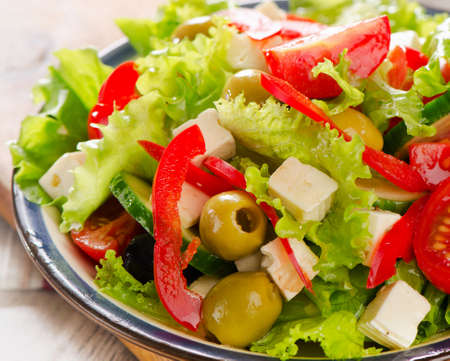 Fresh   salad with feta cheese and olives  . Selective focusの写真素材