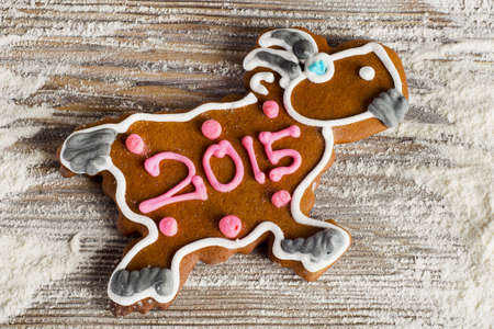 Sweet Christmas  goat on a wooden tableの写真素材
