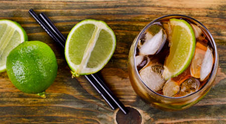 Cuba Libre Drink on a wooden table. Selective focusの写真素材