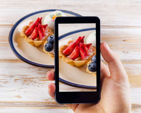 Smartphone shot food photo - dessert with fresh berries.の写真素材