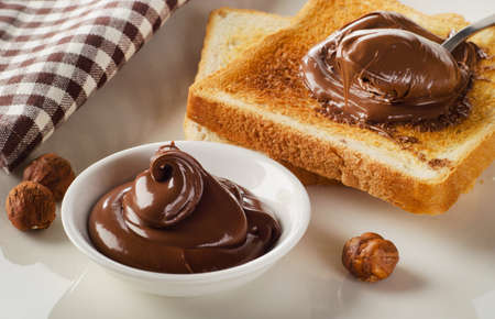 Fresh Toast with sweet chocolate spread for breakfast.の写真素材