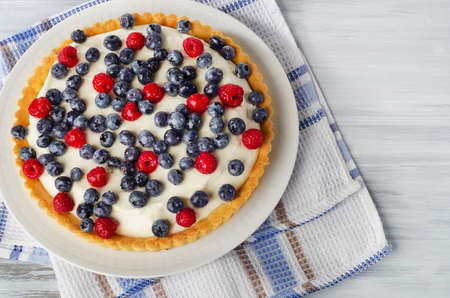 Cake with cream cheese and berries. Top viewの写真素材