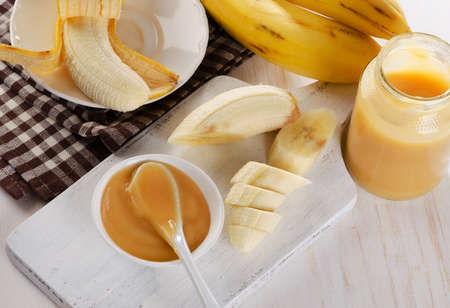 Baby puree in a jar with bananas. Selective focusの写真素材