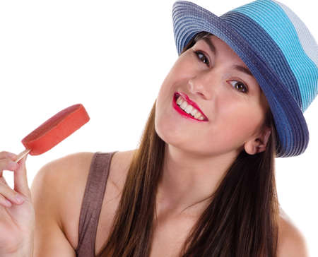Happy woman eating ice cream isolated on  white backgroundの写真素材