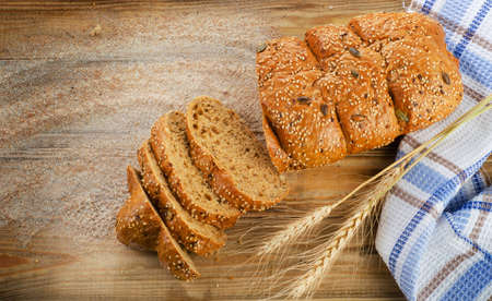Homemade sliced bread  and a flour. Top view