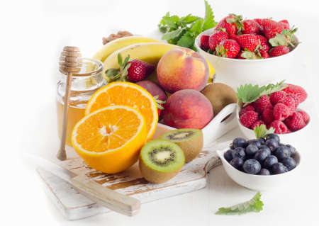 Fresh  fruits, honey and berries. Healthy eating. Selective focusの写真素材