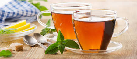 Cups of tea with mint leaves and lemon. Selective focusの写真素材