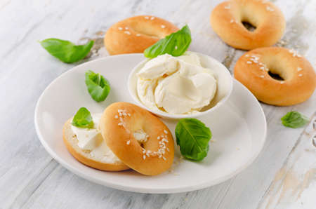 Bagels with cream cheese for healthy breakfast. Selective focusの写真素材