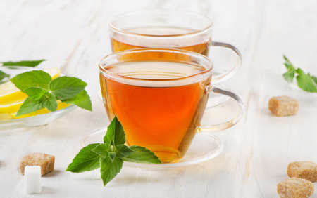 Tea cup with mint and lemon slices. Selective focusの写真素材