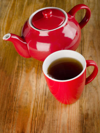Teapot and cups on a wooden table. Selective focusの写真素材