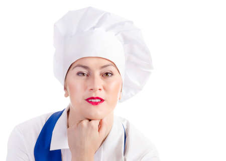 Smiling woman chef isolated on white background.の写真素材