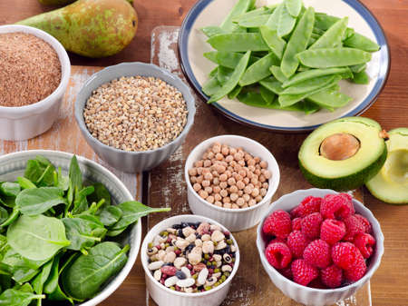Foods rich in Fiber on wooden table. Healthy eating. Selective focusの写真素材