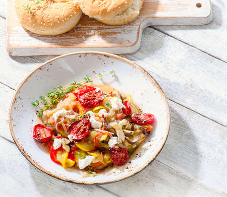 Cooked vegetables with fresh cheese. Healthy diet food.の写真素材