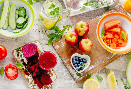 Detox diet. Healthy eating background. Different fruits, juice and vegetables. Top view.の写真素材
