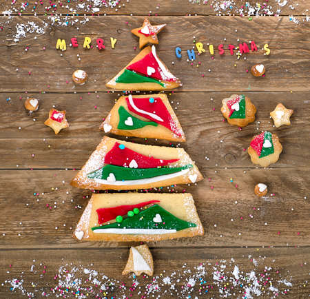 Christmas cookie tree on wooden background. Flat layの写真素材