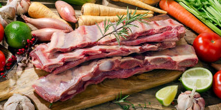 Raw fresh beef ribs and vegetablesの写真素材