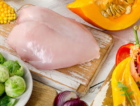 Healthy eating concept. Fruits, vegetables and chicken breast. View from aboveの写真素材