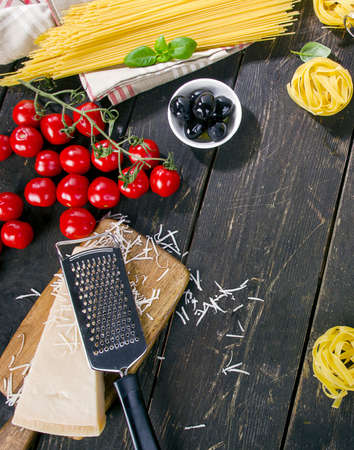 Italian food cooking ingredients  on a wooden table.  Flat layの写真素材