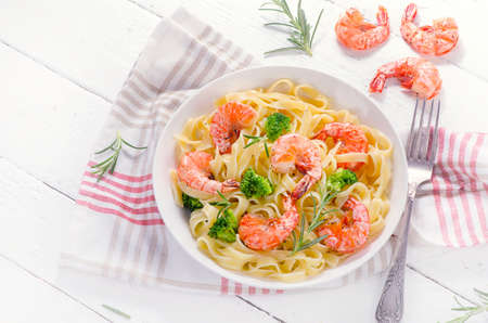 Pasta with shrimps and vegetables. Healthy diet food  concept. Top viewの写真素材