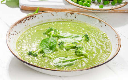 Bowl of green vegetables soup. Selective focusの写真素材