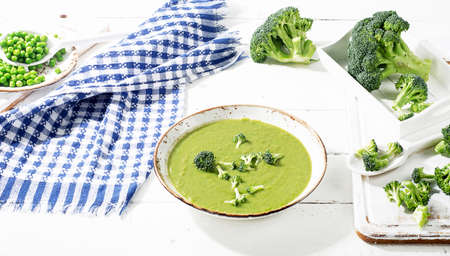 Green vegetables soup with broccoli. Healthy diet concept.Top viewの写真素材