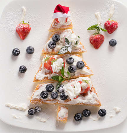 Dessert Christmas tree. New Year food background. Top viewの写真素材