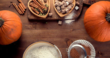 Baking pumpkin pie ingredients. Food background.