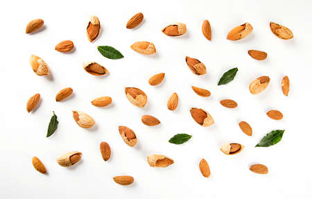 Almond nuts  on white background. Flat lay patternの写真素材