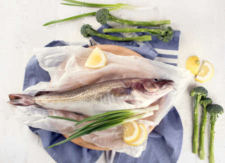 Raw cod fish before cooking. Top viewの写真素材