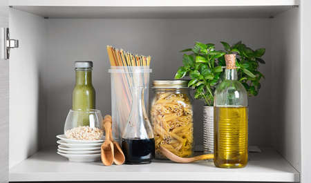 Kitchen pantry with italian food products. Healthy food concept.の写真素材
