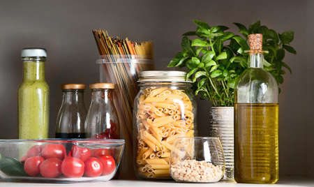 Kitchen pantry with italian food products. Healthy food concept.の写真素材