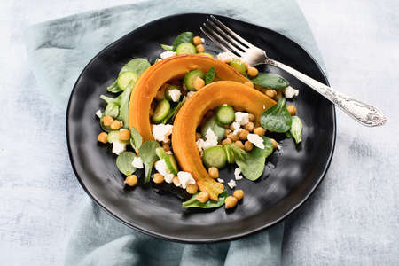 Roasted pumpkin salad with feta and chickpeaの写真素材