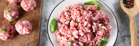 Raw meat balls. Cooking and eating concept