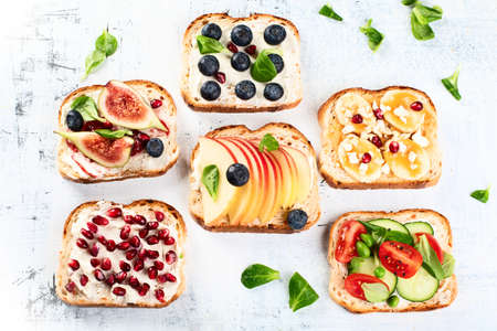 Healthy summer toasts for breakfast. Top viewの写真素材