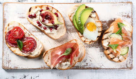 Small sandwiches set. Italian brushetta or spanish tapas の写真素材