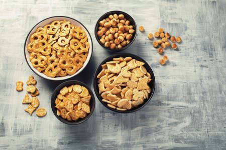 Mix of crackers and popcorn. Top view