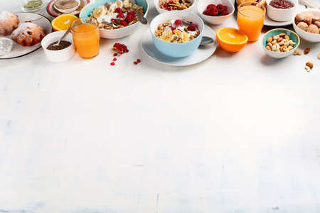 Breakfast table. Healthy breakfast ingredients. Top view with copy space