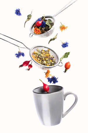 Flying herbal tea. Healthy diet concept.