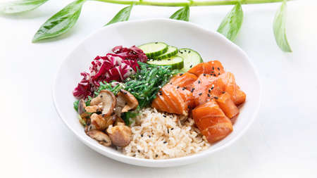 Salmon poke bowl . Top view. Flat lay. Traditional Hawaiian fish salad