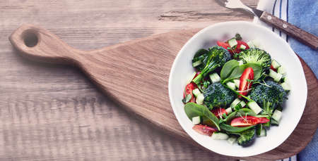 Bowl of fresh vegetable salad with broccoli.の写真素材