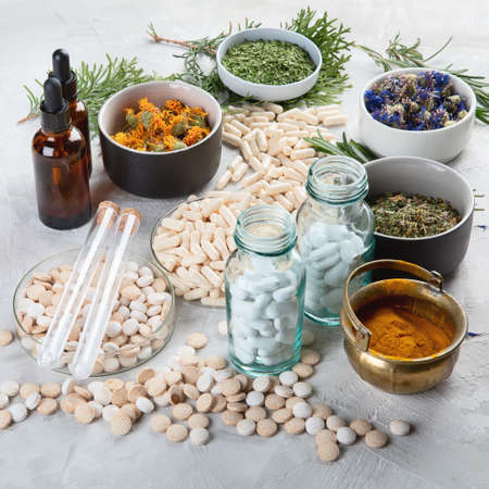 Alternative medicine herbs and homeopathic globules. Homeopathy medicine concept