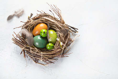 Easter eggs in nest.  Happy Easter. Top view with copy space