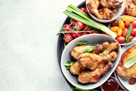 Mixed grilled chicken meat platter. Top view with copy space